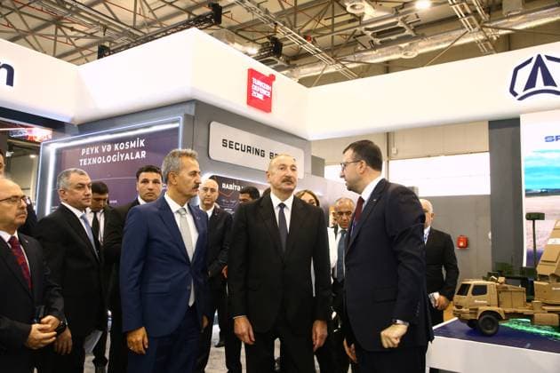 Azerbaijani President Ilham Aliyev visits ASELSAN and Baykar stands at ADEX 2026 BAKU, AZERBAIJAN - SEPTEMBER 30: Azerbaijani President Ilham Aliyev (2nd R) attends the opening of the 6th International Defense Exhibition (ADEX 2026) at Baku Expo Center in Baku, Azerbaijan, on September 30, 2026. Aliyev visits the ASELSAN and Baykar stands, where Turkish Presidency of Defense Industry President Haluk Gorgun, ASELSAN General Manager Ahmet Akyol and Baykar General Manager Haluk Bayraktar provide information about the companies products and technologies. Resul Rehimov Anadolu Baku Azerbaijan. Editorial use only. Please get in touch for any other usage.  Copyright: x2026xAnadoluxResulxRehimovx