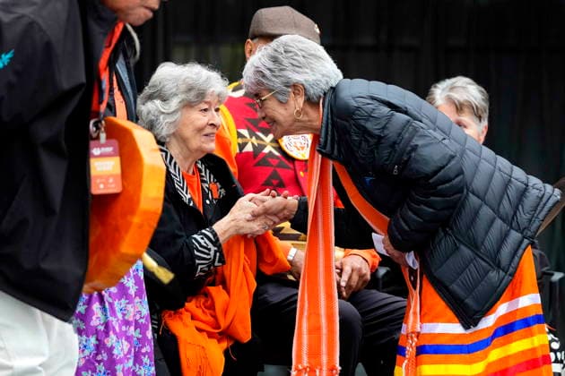 September 30, 2026, Ottawa, On, CAN: Gov. Gen. Louise Arbour shakes hands with Residential School Survivor Ann Lafleur after she shared her story, during the re-raising of the Survivor s Flag ceremony on Parliament Hill in Ottawa, on National Day for Truth and Reconciliation, Wednesday, Sept. 30, 2026. Ottawa CAN  - ZUMAc35_ 20260930_zaf_c35_005 Copyright: xJustinxTangx