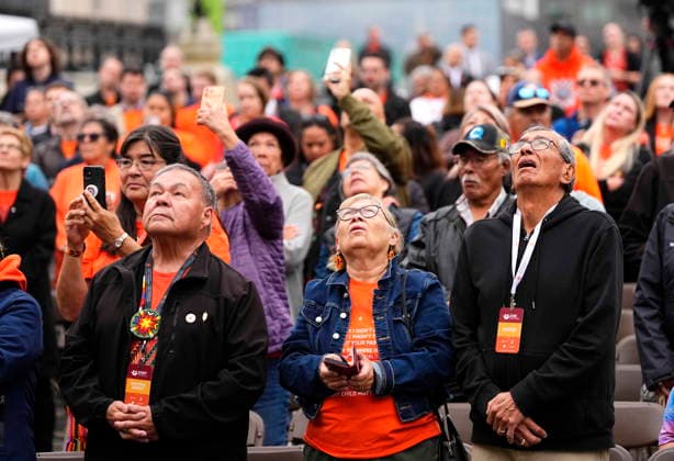 September 30, 2026, Ottawa, On, CAN: People watch the Survivor s Flag rise on Parliament Hill in Ottawa during a ceremony, on National Day for Truth and Reconciliation, Wednesday, Sept. 30, 2026. Ottawa CAN  - ZUMAc35_ 20260930_zaf_c35_009 Copyright: xJustinxTangx