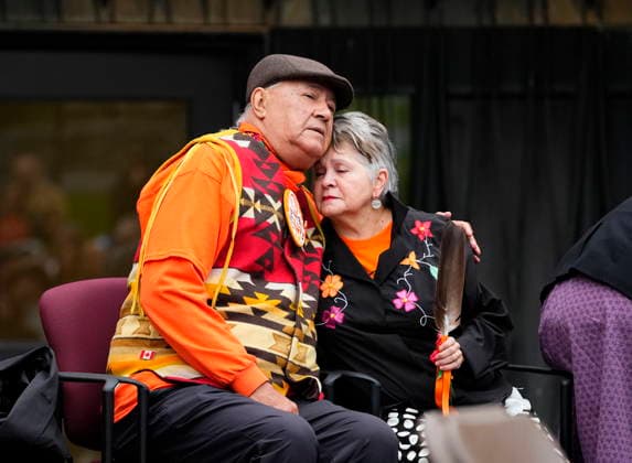 September 30, 2026, Ottawa, On, CAN: Elder Claudette Commanda embraces Residential School Survivor Eugene Arcand after his remarks during the re-raising of the Survivor s Flag ceremony on Parliament Hill in Ottawa, on National Day for Truth and Reconciliation, Wednesday, Sept. 30, 2026. Ottawa CAN  - ZUMAc35_ 20260930_zaf_c35_013 Copyright: xJustinxTangx