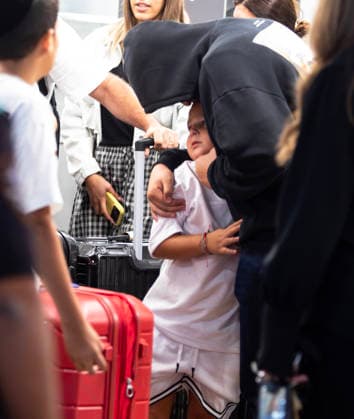 Israeli passengers hug relatives as they exit Ben Gurion International Airport after experiencing an attempted attack aboard a Fly Dubai flight in Lod, Israel on Wednesday, September 30, 2026. The Fly Dubai jet liner was transporting 180 passengers when a co-pilot, who was subdued by passengers, attempted to crash the plane as it approached Tel Aviv.  ISR20260608106 JimxHollander
