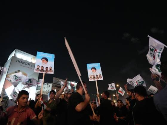 September 30, 2026, Baghdad, Iraq: BAGHDAD, IRAQ, SEPTEMBER 30, 2026: Iraqis and members of the country s security forces gather at Tahrir Square in Baghdad during celebrations marking National Sovereignty Day following the completion of the withdrawal of US forces and the end of the US-led coalition s military mission in Iraq. Participants waved Iraqi flags and security forces took part in commemorative events as the country marked the end of the coalition s military presence. Baghdad Iraq  - ZUMAq101 20260930_zna_q101_165 Copyright: xMuntazerxUdayxSahibx