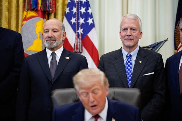 Secretary of Commerce Howard Lutnick and Sen. Dan Sullivan, R-AK, look on as President Donald Trump makes an announcement with Secretary of Commerce Howard Lutnick in the Oval Office of the White House in Washington on September 30, 2026. The Trump Administration announced South Korea will invest $54 billion toward the Alaska Liquefied Natural Gas (LNG) project as part of a broader $200 billion investment in U.S. energy projects.  WASP20260930161 YURIxGRIPAS
