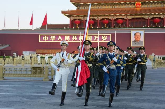 (261001) -- BEIJING, Oct. 1, 2026 -- A flag-raising ceremony marking the 77th anniversary of the founding of the People s Republic of China is held at Tian anmen Square in Beijing, capital of China, Oct. 1, 2026. ) CHINA-BEIJING-NATIONAL DAY-FLAG-RAISING CEREMONY (CN) JuxHuanzong 