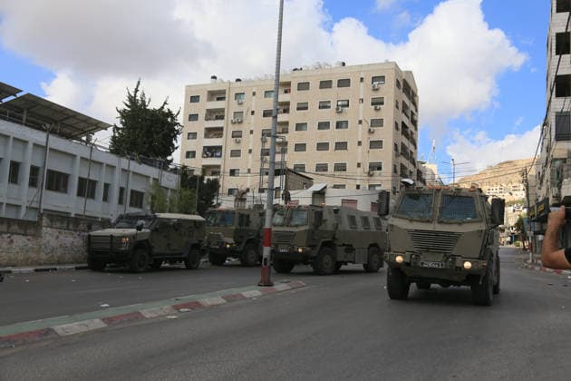 Israeli Security Forces Deploy in Nablus During Jewish Visit Israeli security forces deploy in the streets of the West Bank city of Nablus in the early hours of October 1, 2026, to provide protection for Jewish visitors entering Joseph’s Tomb to pray. Photo by Mohammed Nasser apaimages Nablus West Bank Palestinian Territory 011026_Nablus_MN_00(21) Copyright: xapaimagesxMohammedxNasserx xapaimagesx