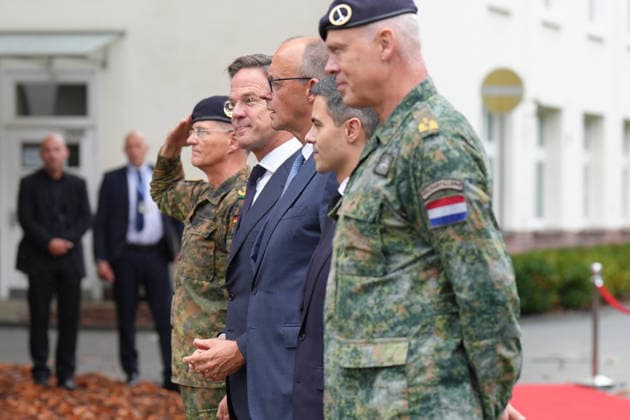 Visit by the German-Dutch Corps with Federal Chancellor Merz; General Freuding, together with Rob Jetten, Prime Minister of the Netherlands, Federal Chancellor Friedrich Merz, and NATO Secretary General Mark Ruette, as well as Lieutenant General Peter Mirow, attended the military honors rendered by the 1st German-Dutch Corps in Münster, October 1, 2026, Münster, North Rhine-Westphali