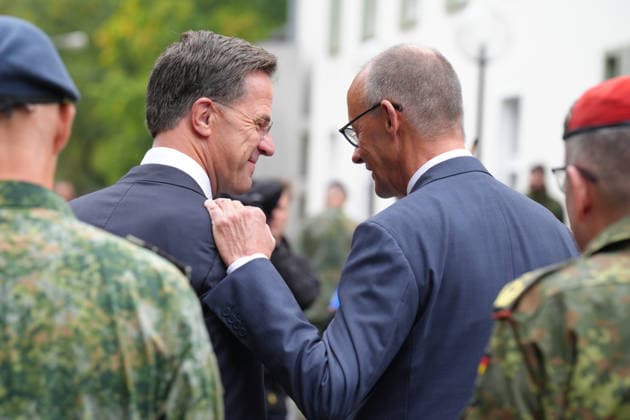 Visit by the German-Dutch Corps with Federal Chancellor Merz; Federal Chancellor Friedrich Merz stands shoulder to shoulder with NATO Secretary General Mark Ruette during the military honors rendered by the 1st German-Dutch Corps, Münster, October 1, 2026, Münster, North Rhine-Westphalia, Germany
