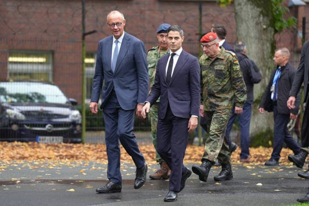 Visit by the German-Dutch Corps with Chancellor Merz: Chancellor Friedrich Merz, together with Rob Jetten, Prime Minister of the Netherlands, on their way to receive military honors from the 1st German-Dutch Corps, Münster, October 1, 2026, Münster, North Rhine-Westphalia, Germany