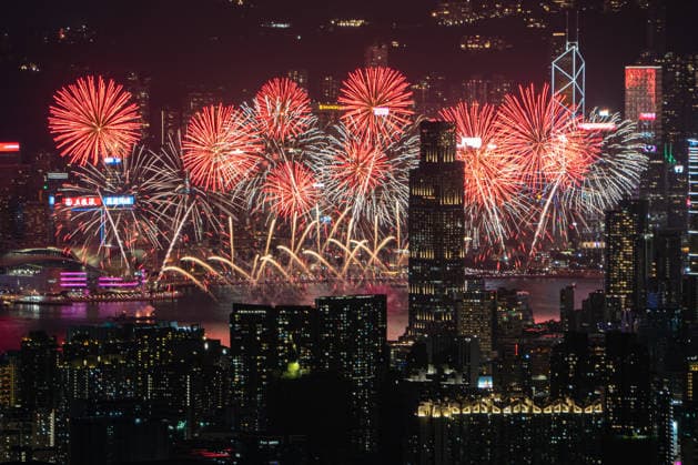 HONG KONG-DAILY NATIONAL-DAY A panoramic general view captured from Kowloon Peak (Fei Ngo Shan) shows fireworks illuminating the night sky above Victoria Harbour during the 77th National Day celebration on October 1, 2026 in Hong Kong, overlooking the expansive cityscapes of the southern Kowloon Peninsula and the illuminated skyline of northern Hong Kong Island. (Photo by Kevin Li TMHK via Nexpher Images) Hong Kong