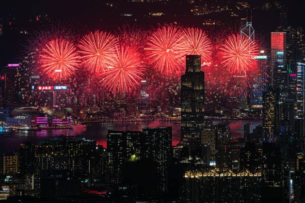 HONG KONG-DAILY NATIONAL-DAY A panoramic general view captured from Kowloon Peak (Fei Ngo Shan) shows fireworks illuminating the night sky above Victoria Harbour during the 77th National Day celebration on October 1, 2026 in Hong Kong, overlooking the expansive cityscapes of the southern Kowloon Peninsula and the illuminated skyline of northern Hong Kong Island. (Photo by Kevin Li TMHK via Nexpher Images) Hong Kong