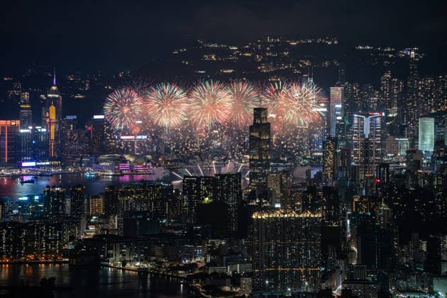 HONG KONG-DAILY NATIONAL-DAY A panoramic general view captured from Kowloon Peak (Fei Ngo Shan) shows fireworks illuminating the night sky above Victoria Harbour during the 77th National Day celebration on October 1, 2026 in Hong Kong, overlooking the expansive cityscapes of the southern Kowloon Peninsula and the illuminated skyline of northern Hong Kong Island. (Photo by Kevin Li TMHK via Nexpher Images) Hong Kong