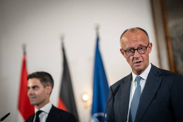 Friedrich Merz, Chancellor of Germany, with Rob Jetten, Prime Minister of the Netherlands (left), during the closing remarks at the meeting between the Chancellor, the Prime Minister of the Netherlands, and the NATO Secretary General at the 1st German-Dutch Corps in Münster, Münster, North Rhine-Westphalia, Germany; German-Dutch Corps