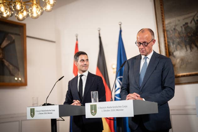 Friedrich Merz, Chancellor of Germany, with Rob Jetten, Prime Minister of the Netherlands (left), during the closing remarks at the meeting between the Chancellor, the Prime Minister of the Netherlands, and the NATO Secretary General at the 1st German-Dutch Corps in Münster, Münster, North Rhine-Westphalia, Germany; German-Dutch Corps
