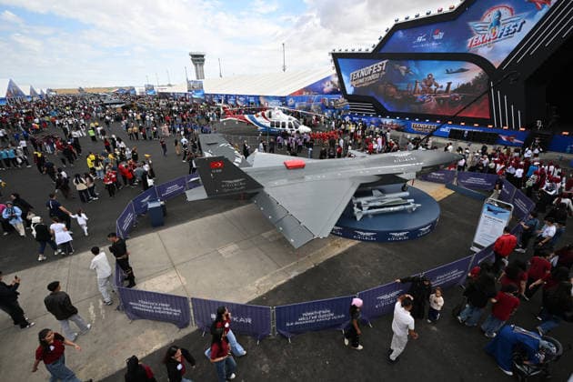 TEKNOFEST Southeast in Turkiye s Sanliurfa SANLIURFA, TURKIYE - OCTOBER 1: People walk through stalls during the second day of the TEKNOFEST aviation, space, and technology festival at Sanliurfa GAP Airport in Sanliurfa, Turkiye, on October 1, 2026. Adsiz Gunebakan Anadolu Sanliurfa Turkey. Editorial use only. Please get in touch for any other usage.  Copyright: x2026xAnadoluxAdsizxGunebakanx
