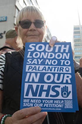 People vs Palantir International Day of Action at Guy s and St Thomas Hospital, London, UK - Thu 01 Oct 2026 Protestors against American data analytics company Palantir gather outside of Guy s and St Thomas Hospital in London, England, UK on Thursday 1 October, 2026 as part of the People vs Palantir International Day of Action calling on NHS England to cancel its £330 million, seven-year contract with Palantir which was awarded in November 2023 to run the nationwide Federated Data Platform (FDP) ., Credit:Justin Ng Avalon UK, England, London, Guy s and St Thomas Hospital Copyright: xJustinxNgx xAvalonx 1139792555