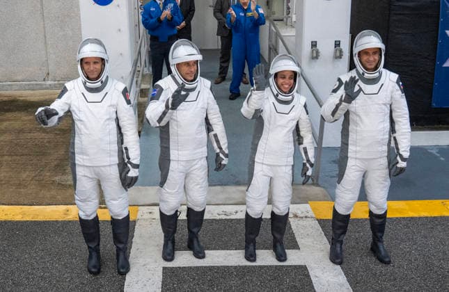 NASA s Crew-13 Astronaut Jessica Watkins, commander(2nd R), Astronaut Luke Delaney , pilot, and Mission Specialists Joshua Kutryk(L) of the Canadian Space Agency and Sergey Teteryatnikov of Roscosmos (R) walk out of the operations building on their way to board as Dragon Spacecraft atop a SpaceX Falcon 9 rocket on SLC-40 at Kennedy Space Center, Florida on Thursday, October 1, 2026. They are on their way to the International Space Station.  KSC2026100133 PATxBENIC