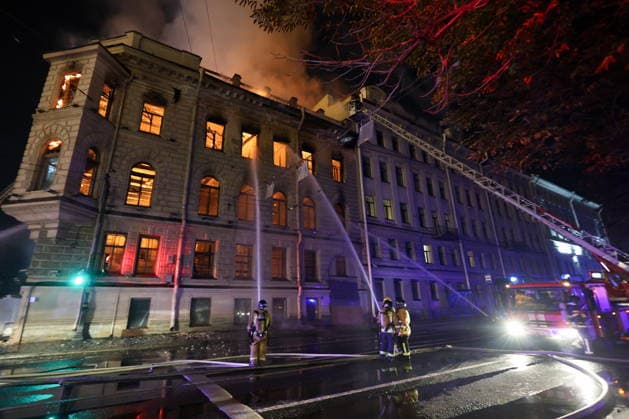 RUSSIA, ST PETERSBURG - OCTOBER 1, 2026: Fire crews battle a fire at the Miller Manions in St Isaac s Square. Valentin Yegorshin TASS  98632770
