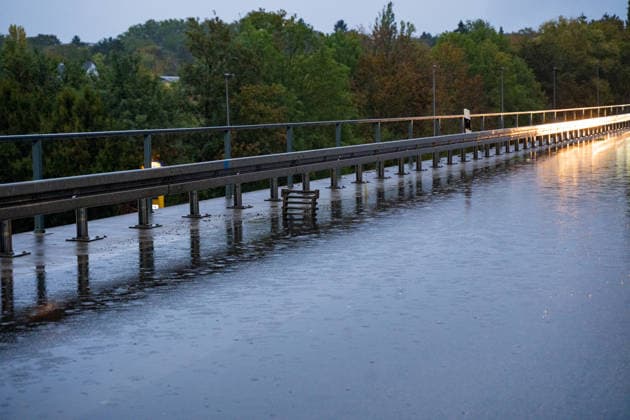 Traffic Accident on a Flooded Roadway; One Person Rescued from Ve