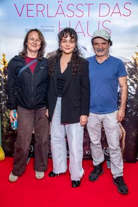 ABB s Josefine Jikeli, Via Jikeli, and Metin Erd on the red carpet at the special screening of the feature film *Frau Winkler Leaves the House* at the Cinema Parisl in Berlin on October 1, 2026, Berlin, Germany