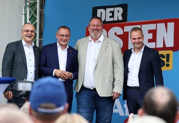 Enjoying a bratwurst with Haseloff and Chrupalla, October 1, 2026, Doellstaedt, AfD event at Kiesling Roofing; enjoying a bratwurst with State Parliament Representative Daniel Haseloff (AfD) and AfD Federal Spokesperson Tino Chrupalla; pictured: Marcus Buehl, Member of the Bu