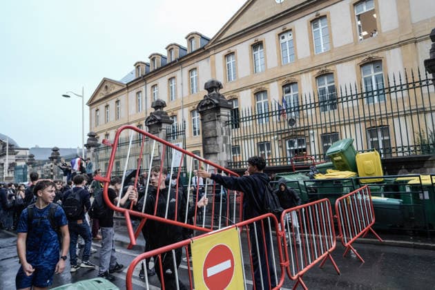 Students clash with police during high-school mobilization in Nancy NANCY, FRANCE - OCTOBER 2: Students gather around several schools and clash with police forces as a nationwide high-school mobilization continues over school conditions and demands for greater education resources in Nancy, France on October 2, 2026. Police deploy security units around several locations as demonstrations and blockades continue. Muhammed Said Tako Anadolu Nancy France. Editorial use only. Please get in touch for any other usage.  Copyright: x2026xAnadoluxMuhammedxSaidxTakox