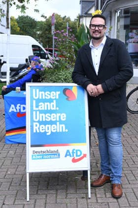 AfD Oberhausen information booth on October 2, 2026, at the Osterfelder Markt in Oberhausen. Members of the Oberhausen district association are manning the booth. Also present is AfD state legislative candidate Kevin Burmeister. xRx