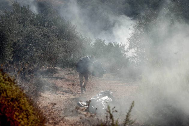 Israeli settlers intervene against Palestinians olive-picking event in Nablus town NABLUS, WEST BANK, PALESTINE - OCTOBER 02: Israeli settlers, under the protection of Israeli forces, intervene against an olive-picking event organized by Palestinians and a group of activists in the town of Beita, in Nablus, West Bank, Palestine on October 02, 2026. Issam Rimawi Anadolu Nablus West Bank. Editorial use only. Please get in touch for any other usage.  Copyright: x2026xAnadoluxIssamxRimawix