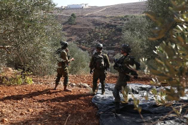Israeli Settlers And Forces Attacked Palestinian Farmers During Olive Harvest In Beita BEITA, NABLUS, PALESTINE OCTOBER 2, 2026: Israeli settlers and Israeli forces attacked Palestinian farmers while they were picking olives in the Jabal Al-Arma area, east of Beita, south of Nablus. Settlers fired live ammunition toward the farmers, with no injuries reported. According to the Palestinian Red Crescent Society, Israeli forces also beat a 46-year-old Palestinian farmer during raids on olive farms in Beita. Witnesses told Anadolu that Israeli forces fired stun grenades and tear gas at farmers in the Jabal Al-Arma area, forcing them to leave. The olive harvest begins in early October and continues through the end of November, making it an im Copyright: x xSalmanxMohsenxAlkhatibx xJNAxPressx