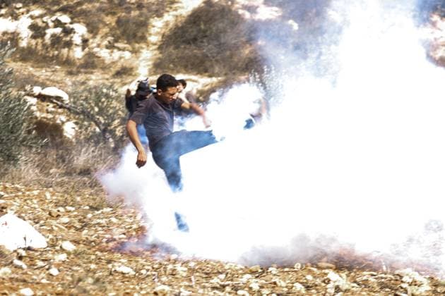 Israeli Settlers And Forces Attacked Palestinian Farmers During Olive Harvest In Beita BEITA, NABLUS, PALESTINE OCTOBER 2, 2026: Israeli settlers and Israeli forces attacked Palestinian farmers while they were picking olives in the Jabal Al-Arma area, east of Beita, south of Nablus. Settlers fired live ammunition toward the farmers, with no injuries reported. According to the Palestinian Red Crescent Society, Israeli forces also beat a 46-year-old Palestinian farmer during raids on olive farms in Beita. Witnesses told Anadolu that Israeli forces fired stun grenades and tear gas at farmers in the Jabal Al-Arma area, forcing them to leave. The olive harvest begins in early October and continues through the end of November, making it an im Copyright: x xSalmanxMohsenxAlkhatibx xJNAxPressx