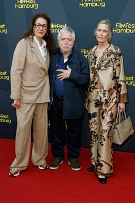 Malika Rabahallah, Wolf Biermann, and Pamela Biermann at the premiere of the documentary *Biermann* at the 34th Hamburg Film Festival in 2026 at Cinemaxx Dammtor in Hamburg, October 2, 2026 Foto:xC.xTamckex xFuturexImagex biermann_6009