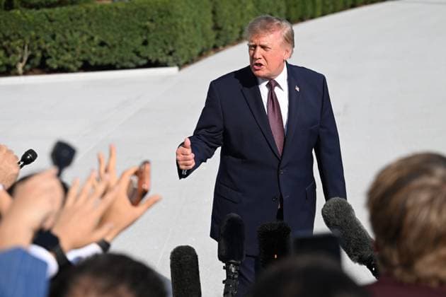 October 2, 2026, Washington, Dc, USA: U.S. President Donald Trump talks to the media before boarding Marine One on the South Lawn of the White House in Washington, DC, United States, on October 2, 2026. Washington USA  - ZUMAs197 20261002_aaa_s197_264 Copyright: xKylexMazzax