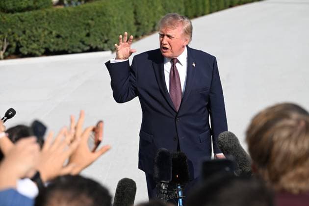October 2, 2026, Washington, Dc, USA: U.S. President Donald Trump talks to the media before boarding Marine One on the South Lawn of the White House in Washington, DC, United States, on October 2, 2026. Washington USA  - ZUMAs197 20261002_aaa_s197_270 Copyright: xKylexMazzax