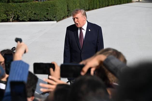 October 2, 2026, Washington, Dc, USA: U.S. President Donald Trump talks to the media before boarding Marine One on the South Lawn of the White House in Washington, DC, United States, on October 2, 2026. Washington USA - ZUMAs197 20261002_aaa_s197_267 Copyright: xKylexMazzax
