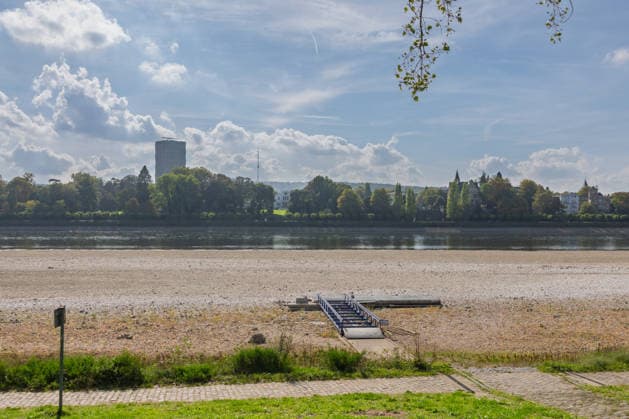 Low Water Levels on the Rhine in Bonn: View from the Beuel Riverbank, October 2, 2026. View from the Beuel riverbank in Bonn of the Rhine riverbed, which is largely exposed due to the ongoing low water levels. Navigation is restricted; the water level at Bonn is 64 cm, just slightly above the record Copyright: xMarcxJohnx