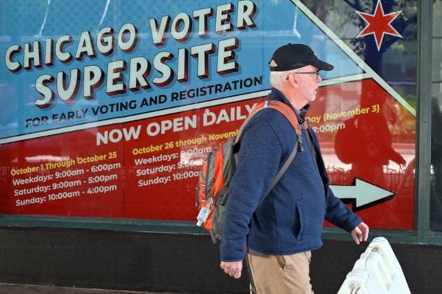 Early voting begins in Chicago ahead of November 3 General Election CHICAGO, ILLINOIS – OCTOBER 2, 2026: A pedestrian walks past signage displaying voting hours at the Chicago Voter Supersite at 137 S. State St. in downtown Chicago, Illinois, on October 2, 2026. The Supersite opened October 1 for early voting and registration ahead of the November 3 General Election. Jacek Boczarski Anadolu Illinois United States. Editorial use only. Please get in touch for any other usage.  Copyright: x2026xAnadoluxJacekxBoczarskix