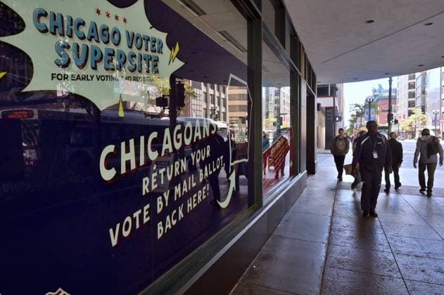 Early voting begins in Chicago ahead of November 3 General Election CHICAGO, ILLINOIS – OCTOBER 2, 2026: A pedestrians walks past a window display for the Chicago Voter Supersite at 137 S. State St. in downtown Chicago, Illinois, on October 2, 2026. The Supersite opened October 1 for early voting and registration ahead of the November 3 General Election. Jacek Boczarski Anadolu Illinois United States. Editorial use only. Please get in touch for any other usage.  Copyright: x2026xAnadoluxJacekxBoczarskix