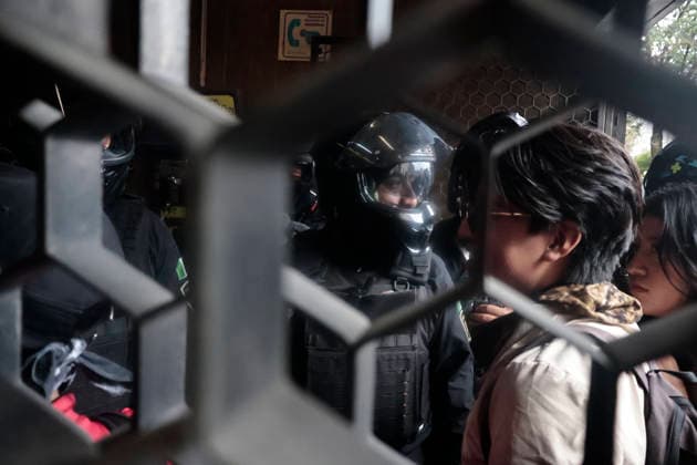 October 2, 2026, Mexico City, Cdmx, Mexico: Thousands of people carrying placards gathered at the Plaza de las Tres Culturas and the surrounding area to commemorate the 58th anniversary of the 1968 student massacre in Tlatelolco; they marched toward Mexico City s ZoÂ³calo to hold a rally in memory of those who died during the 1968 student movement. Prior to this, hundreds of students arrived at the meeting point near the Tlatelolco Metro station, where a heavy police deployment from the Secretariat of Citizen Security (SSCCDMX) was already waiting for them; these hooded officers on motorcycles boxed the students in, both inside and outside the metro facilities, to prevent their peaceful movement, sparking conflict through abuses of authori - ZUMAp204 20261002_zip_p204_040 Copyright: xJosuexPerezx