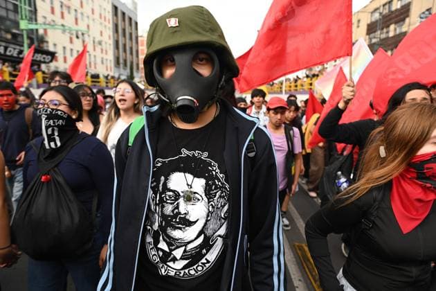 October 2, 2026: TO-45322-MEXICO , October 2, 2026. Student leaders from 1968 marched alongside students from various public universities, feminist collectives, "searching mothers," and Indigenous people from diverse regions to commemorate the anniversary of the Tlatelolco Massacre. They chanted slogans such as "No forgiveness, no forgetting," "Death to the State," and "It was the military." They marched along various avenues in the Mexican capital, concluding their rally at the Z& xf3;calo plaza, where clashes broke out with police stationed behind the barriers guarding the National Palace. In Mexico City. Clasos.com.mx - ZUMAcs4_ 20261002_faa_cs4_175 Copyright: xJavierxLiraxOterox