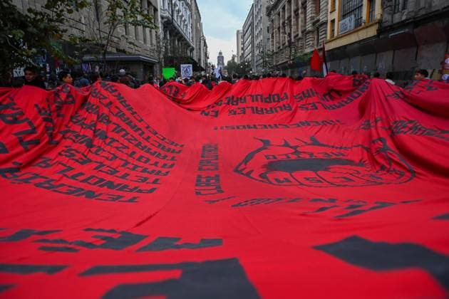 October 2, 2026: TO-45322-MEXICO , October 2, 2026. Student leaders from 1968 marched alongside students from various public universities, feminist collectives, "searching mothers," and Indigenous people from diverse regions to commemorate the anniversary of the Tlatelolco Massacre. They chanted slogans such as "No forgiveness, no forgetting," "Death to the State," and "It was the military." They marched along various avenues in the Mexican capital, concluding their rally at the Z& xf3;calo plaza, where clashes broke out with police stationed behind the barriers guarding the National Palace. In Mexico City. Clasos.com.mx - ZUMAcs4_ 20261002_faa_cs4_146 Copyright: xJavierxLiraxOterox