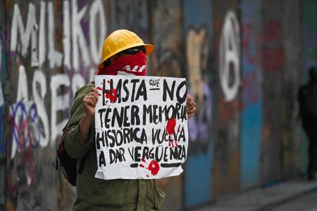 October 2, 2026: TO-45322-MEXICO , October 2, 2026. Student leaders from 1968 marched alongside students from various public universities, feminist collectives, "searching mothers," and Indigenous people from diverse regions to commemorate the anniversary of the Tlatelolco Massacre. They chanted slogans such as "No forgiveness, no forgetting," "Death to the State," and "It was the military." They marched along various avenues in the Mexican capital, concluding their rally at the Z& xf3;calo plaza, where clashes broke out with police stationed behind the barriers guarding the National Palace. In Mexico City. Clasos.com.mx - ZUMAcs4_ 20261002_faa_cs4_131 Copyright: xJavierxLiraxOterox
