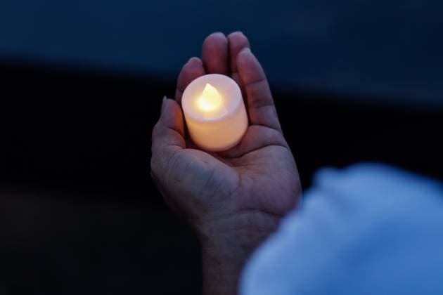 October 2, 2026, La Guaira, Venezuela (Bolivarian Republic of: LA GUAIRA, VENEZUELA, OCTOBER 2, 2026: Families of victims, survivors and rescue workers gather during the Haz de Luz vigil in La Guaira to commemorate 100 days since the devastating earthquakes of June 24. Participants lit candles and joined prayers in memory of those killed and missing, while beams of light were projected into the sky near areas heavily damaged by the disaster. The commemorative event brought together residents, volunteers and emergency workers as recovery and search efforts continue in parts of La Guaira. La Guaira Venezuela (Bolivarian Republic of - ZUMAq101 20261002_zna_q101_309 Copyright: xMarioxFloresx