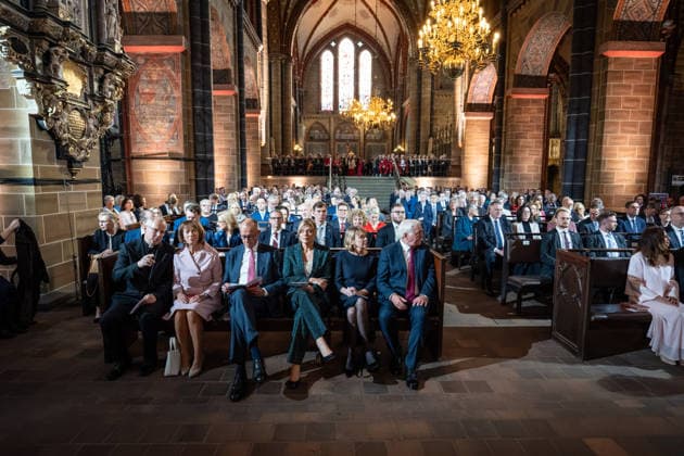 Ecumenical Service at St. Petri Cathedral: Hubertus van Megen, Apostolic Nuncio to Germany; Charlotte Merz, wife of Friedrich Merz; Friedrich Merz, Federal Chancellor; Julia Klöckner, President of the Bundestag; Elke Büdenbinder, wife of Frank-Walter Steinmeier; Frank-Walter Steinmeier