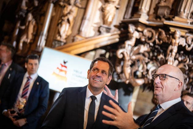Ecumenical service at St. Petri Cathedral: Olaf Lies, Minister-President of Lower Saxony, with Dietmar Woidke, Minister-President of Brandenburg (from left). Official central celebrations for German Unity Day 2026 in Bremen, Bremen, Germany, downtown