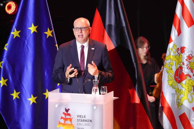 German Unity Day Ceremony in Bremen: Andreas Bovenschulte, President of the Bundesrat and Mayor of Bremen, is pictured gesturing during his speech at the German Unity Day ceremony at the Glocke, Bremen, October 3, 2026, Bremen, Germany