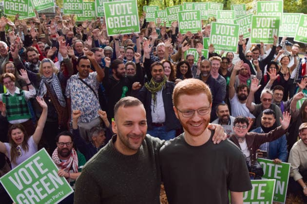 October 3, 2026, London, England, United Kingdom: Green Party leader ZACK POLANSKI and co-leader of the Scottish Green Party ROSS GREER stand with supporters in St Pancras Gardens as Zack Polanski continues his campaign ahead of the upcoming Holborn and St Pancras by-election. London United Kingdom - ZUMAv130 20261003_zip_v130_013 Copyright: xVukxValcicx