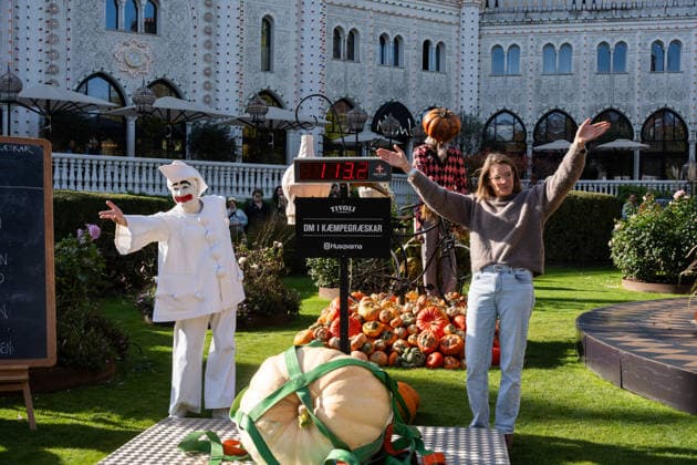 Danish Giant Pumpkin Championship Results: Line Bech Hald from Ringsted with her pumpkin weighing 113.2 kg at the Danish Giant Pumpkin Championship in Tivoli, Copenhagen, on Saturday, October 3, 2026. Photo by Emil Nicolai Helms, Scanpix 2026, Copenhagen, Denmark  Copyright: EmilxNicolaixHelmsx spdk20261003-132614-L