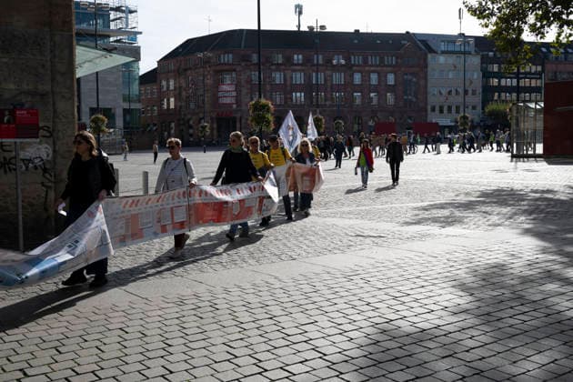 October 3, 2026 Press Event: Es brennt Initiative Human Chain in Dortmund, Hansaplatz Marching with the banner to Westenhellweg, Dortmund; Hansaplatz and Westenhellweg, North Rhine-Westphalia, Germany