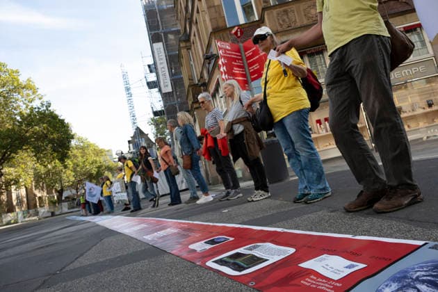 October 3, 2026 Press event: Es brennt initiative—human chain in Dortmund, Hansaplatz; participants on Westenhellweg, Dortmund; Hansaplatz and Westenhellweg, North Rhine-Westphalia, Germany