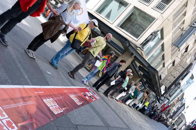 October 3, 2026 Press event: Es brennt initiative—human chain in Dortmund, Hansaplatz; participants on Westenhellweg, Dortmund; Hansaplatz and Westenhellweg, North Rhine-Westphalia, Germany