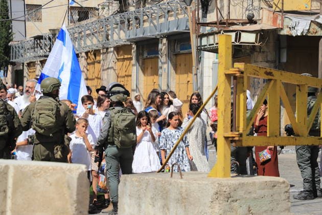 Israeli forces raid Hebron on Sukkot holiday HEBRON, WEST BANK, PALESTINE - OCTOBER 03: Israeli soldiers restrict the movement of Palestinians and take security measures as they raid the Old Town on the occasion of Sukkot feast in Hebron, West Bank, Palestine on October 03, 2026. Amer Shallodi Anadolu Hebron West Bank. Editorial use only. Please get in touch for any other usage.  Copyright: x2026xAnadoluxAmerxShallodix